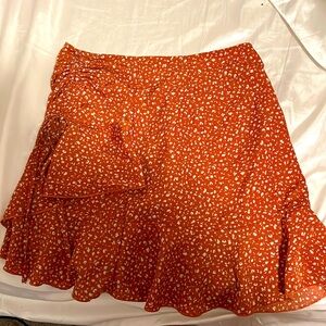 A orange and white skirt
